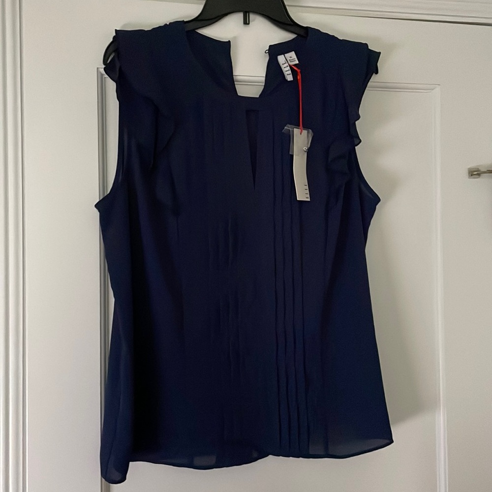 Sleeveless ruffled blouse